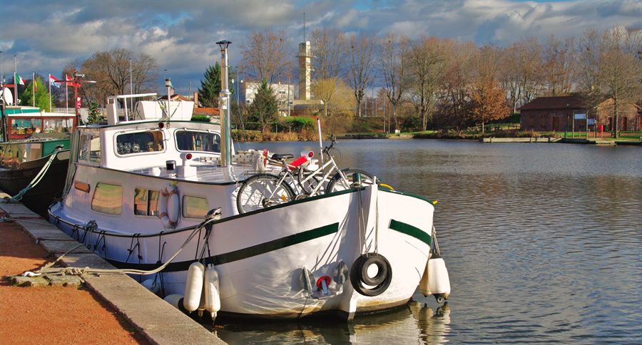 Small canal barge moored in Roanne, France