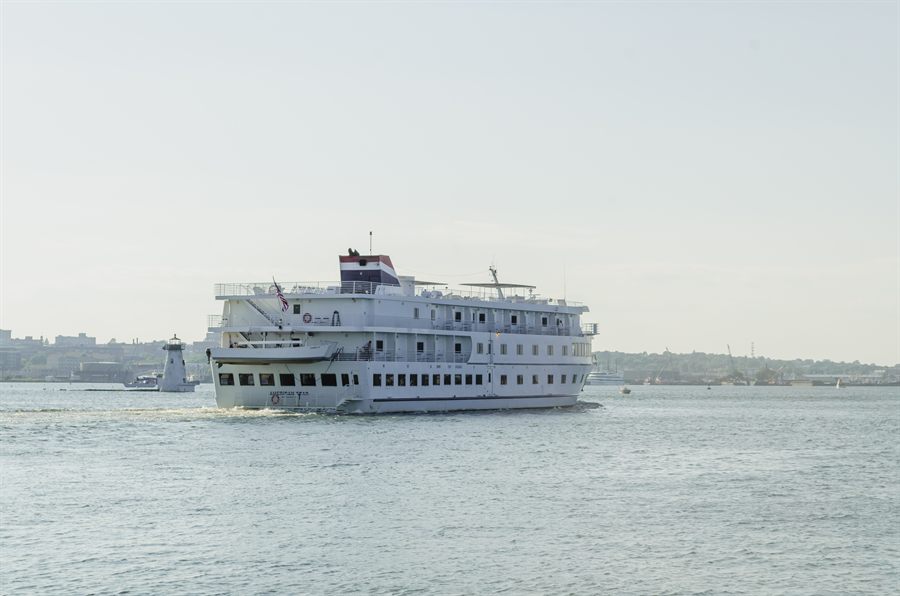 American small cruise ship sailing into New Bedford harbor